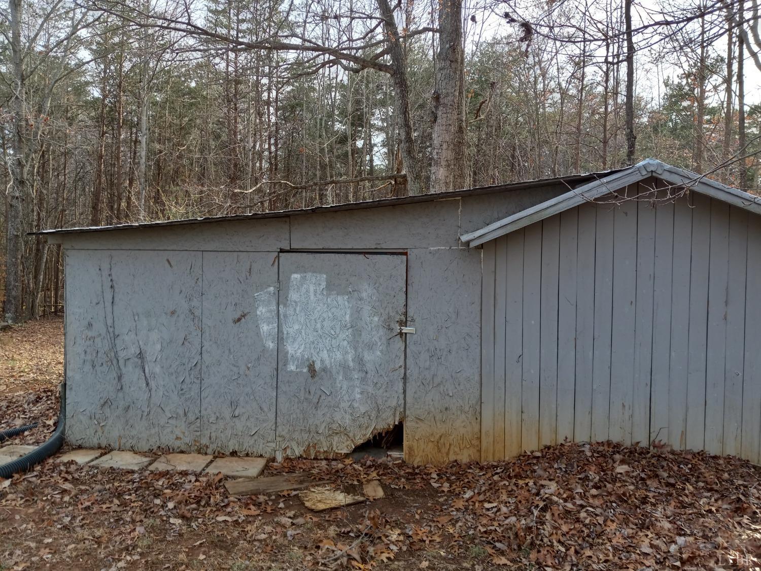 468 Hawkins Road Evington, VA 24550 - Photo 26 of 31 a wooden door in front of a house