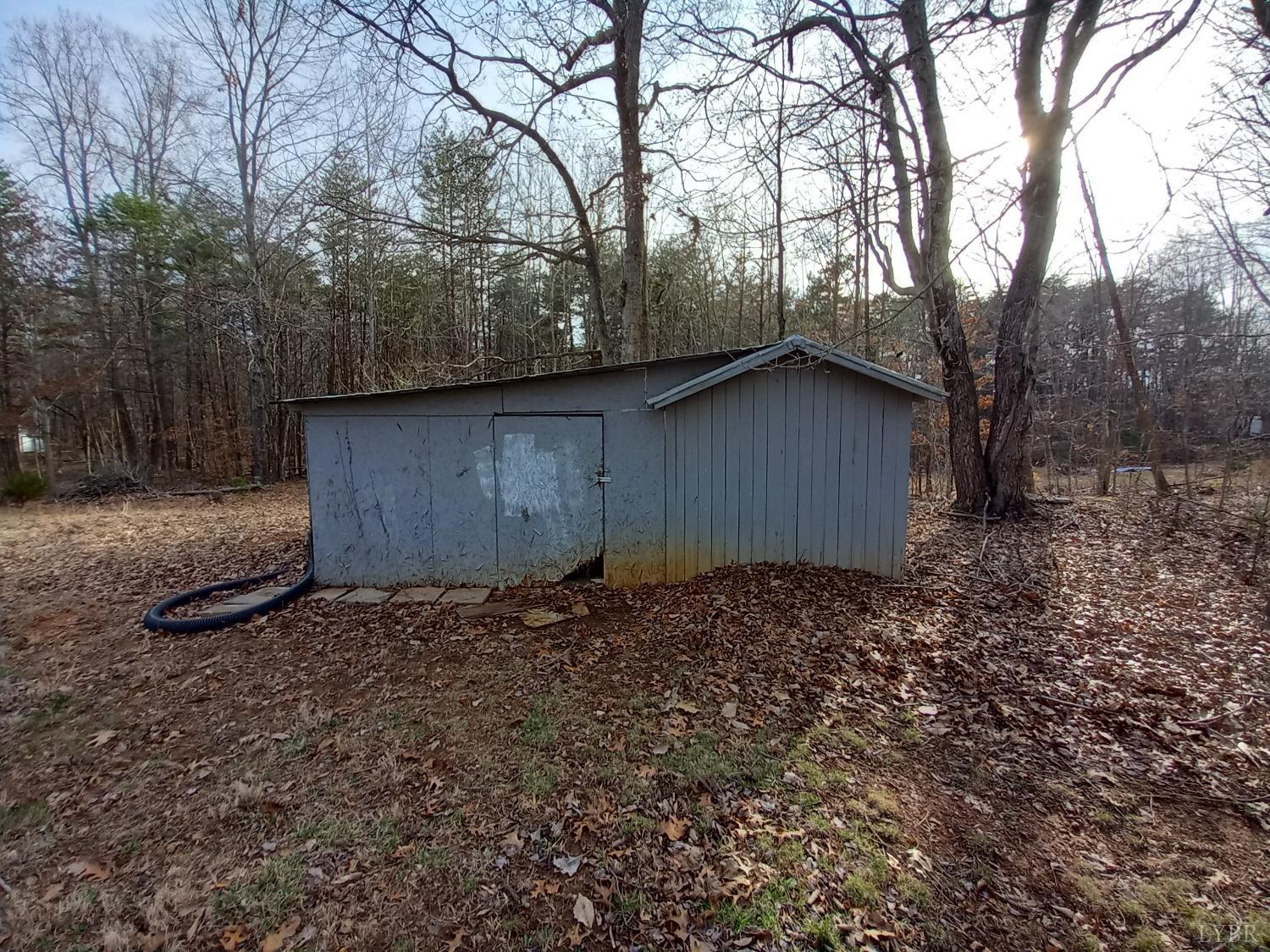 468 Hawkins Road Evington, VA 24550 - Photo 27 of 31 a backyard of a house with lots of green space