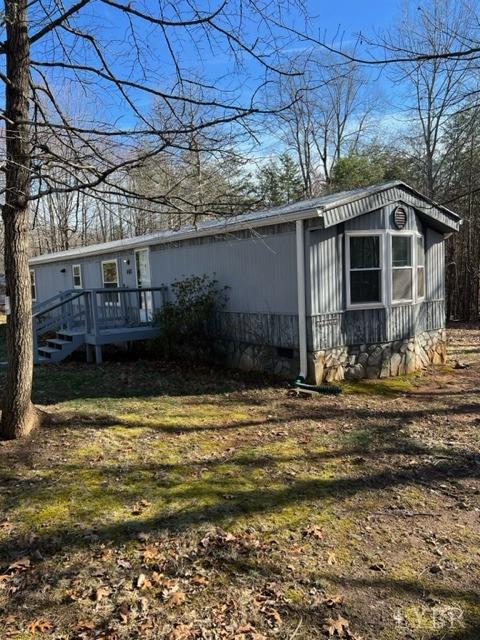 468 Hawkins Road Evington, VA 24550 - Photo 30 of 31 a view of a house with a yard