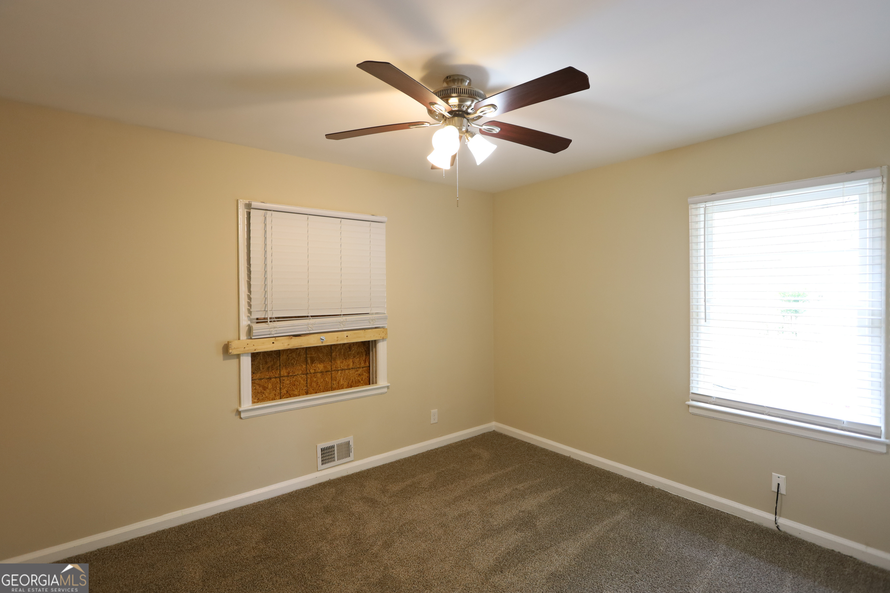 2364 Farley Street East Point, GA 30344 - Photo 9 of 10 a view of an empty room with a window