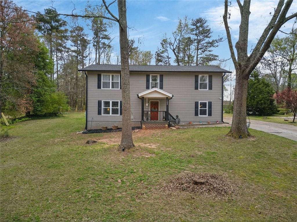 7280 Valley Drive Winston, GA 30187 - Photo 1 of 35 front view of a house with a yard