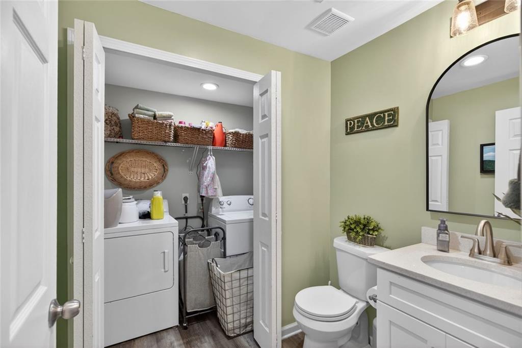 7280 Valley Drive Winston, GA 30187 - Photo 15 of 35 a bathroom with a toilet a sink and a mirror