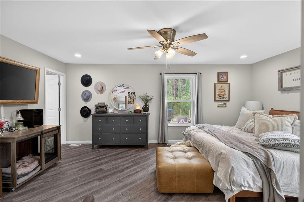 7280 Valley Drive Winston, GA 30187 - Photo 20 of 35 a bedroom with a bed and a flat screen tv
