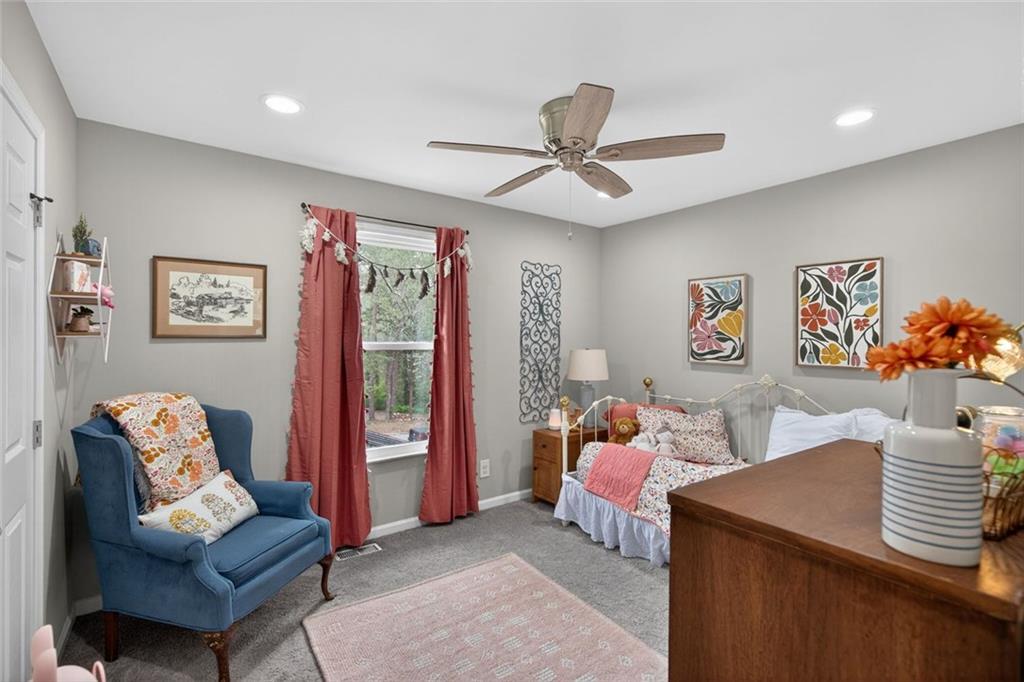 7280 Valley Drive Winston, GA 30187 - Photo 26 of 35 a bedroom with furniture and a wooden floor