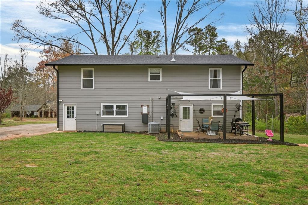 7280 Valley Drive Winston, GA 30187 - Photo 29 of 35 a view of a house with a yard