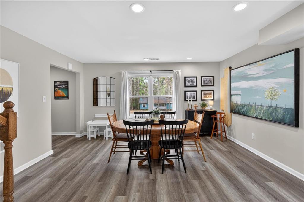 7280 Valley Drive Winston, GA 30187 - Photo 10 of 35 a view of a dining room with furniture window and wooden floor