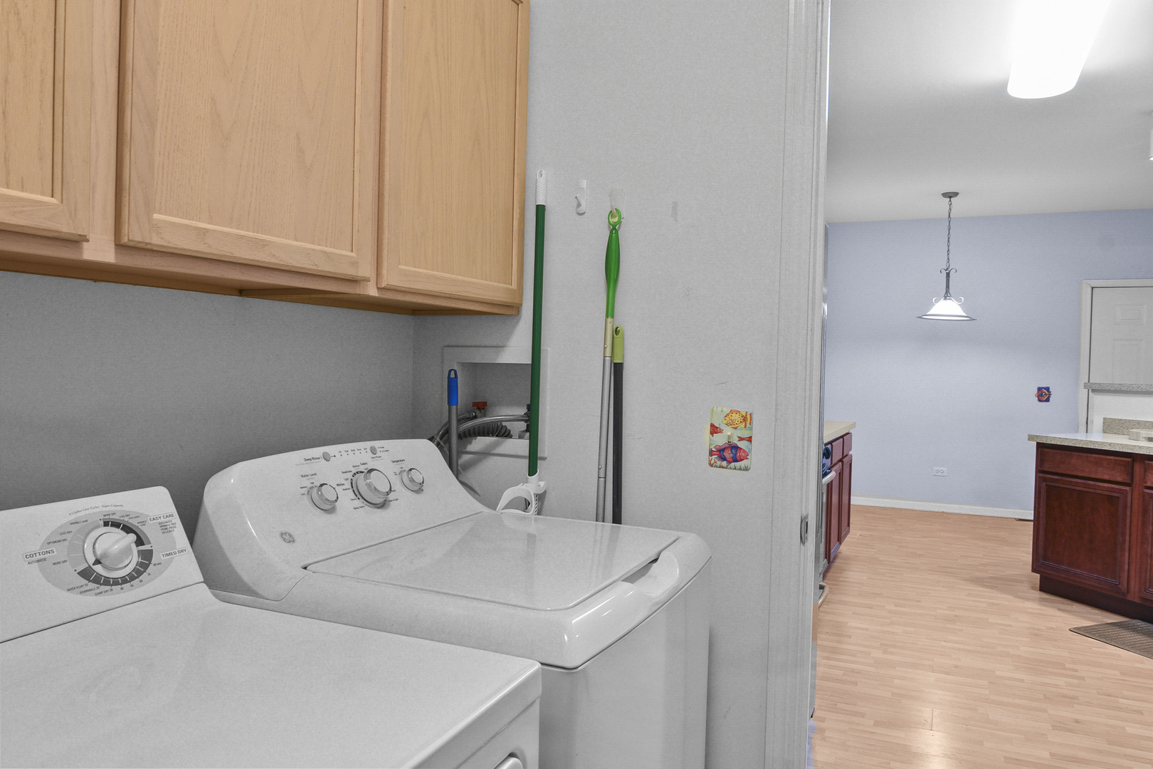 8815 Concord Lane, Unit G Justice, IL 60458 - Photo 14 of 27 a utility room with dryer and washer