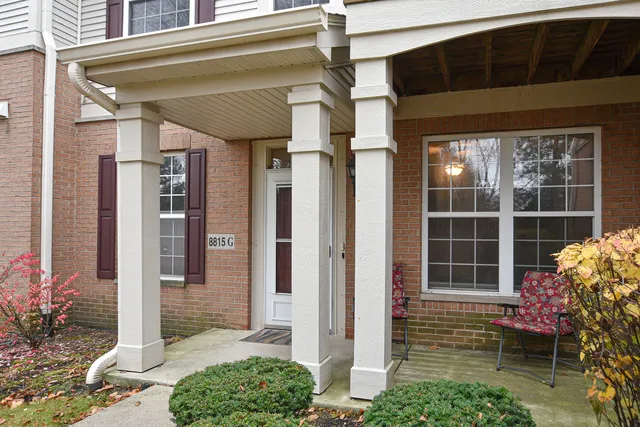 a front view of a house with a porch