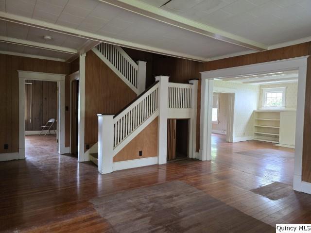 242 Main Street Carthage, IL 62321 - Photo 8 of 28 a view of staircase with white walls and wooden floor