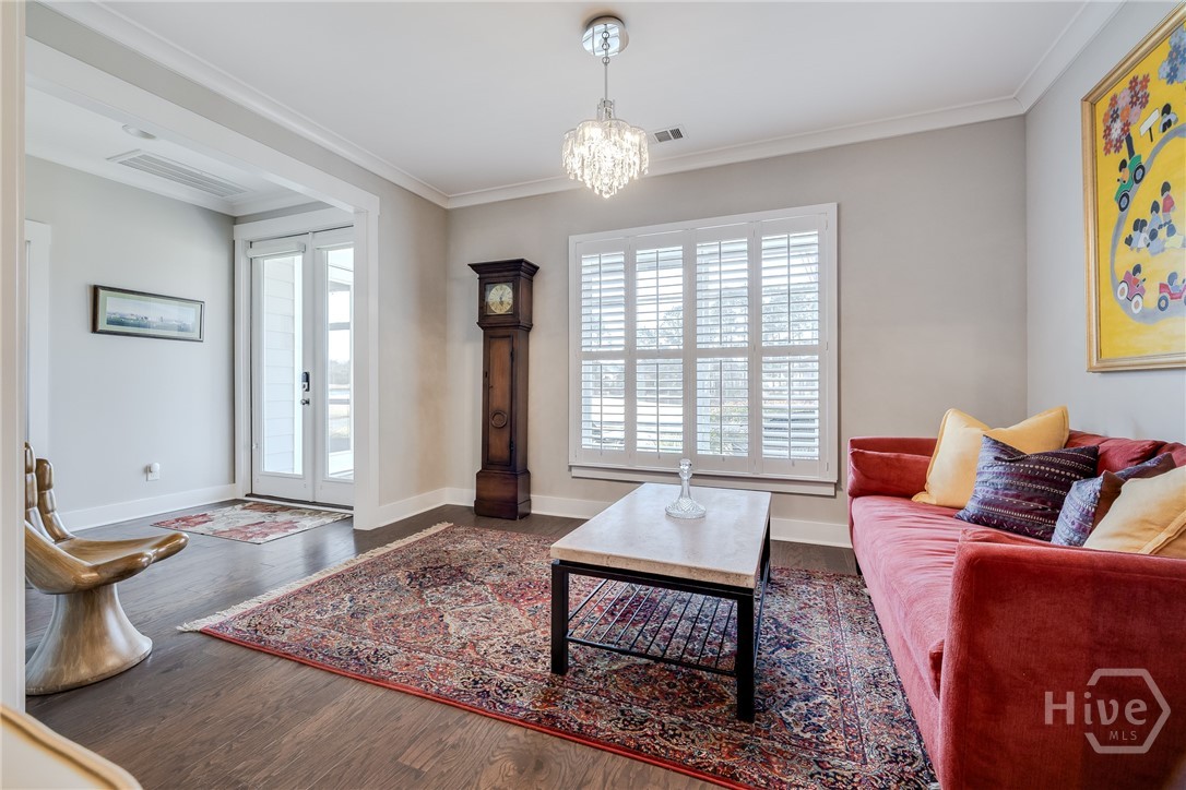 119 Danbury Court Pooler, GA 31322 - Photo 16 of 37 Carolina Room - view of screened porch/golf course and back Foyer