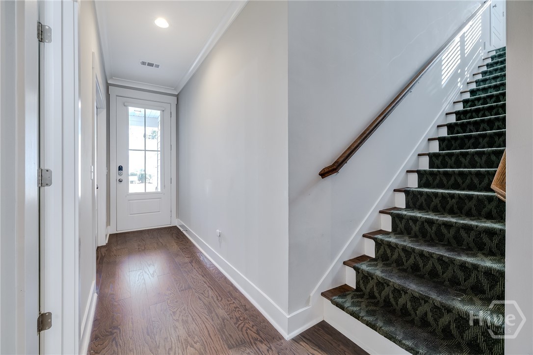 119 Danbury Court Pooler, GA 31322 - Photo 27 of 51 Front Foyer and staircase with rails on either side to second level