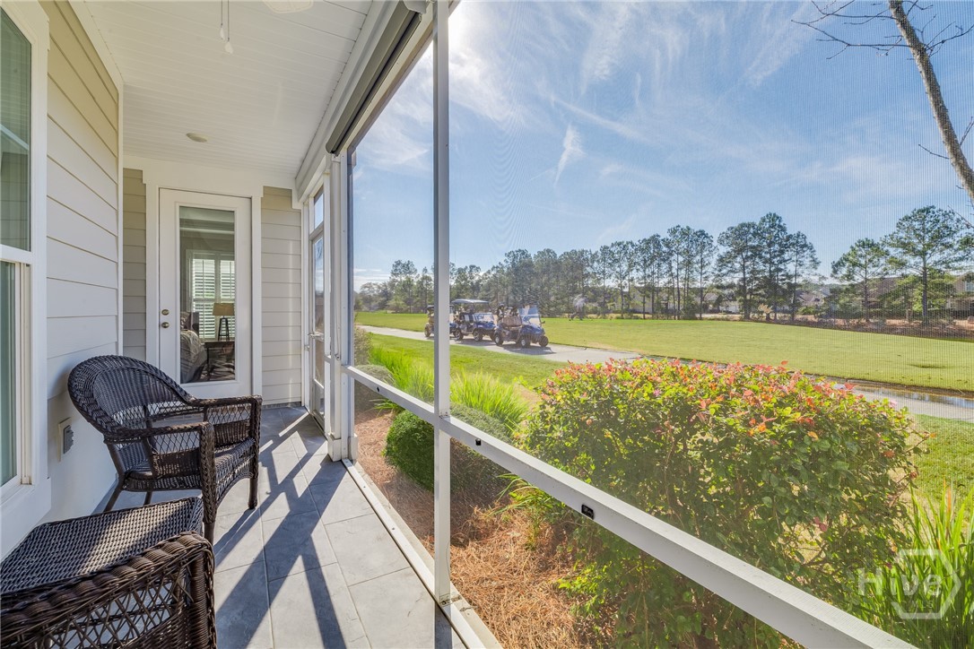 119 Danbury Court Pooler, GA 31322 - Photo 37 of 51 Screened Porch - with view of Primary bedroom access dore with shades