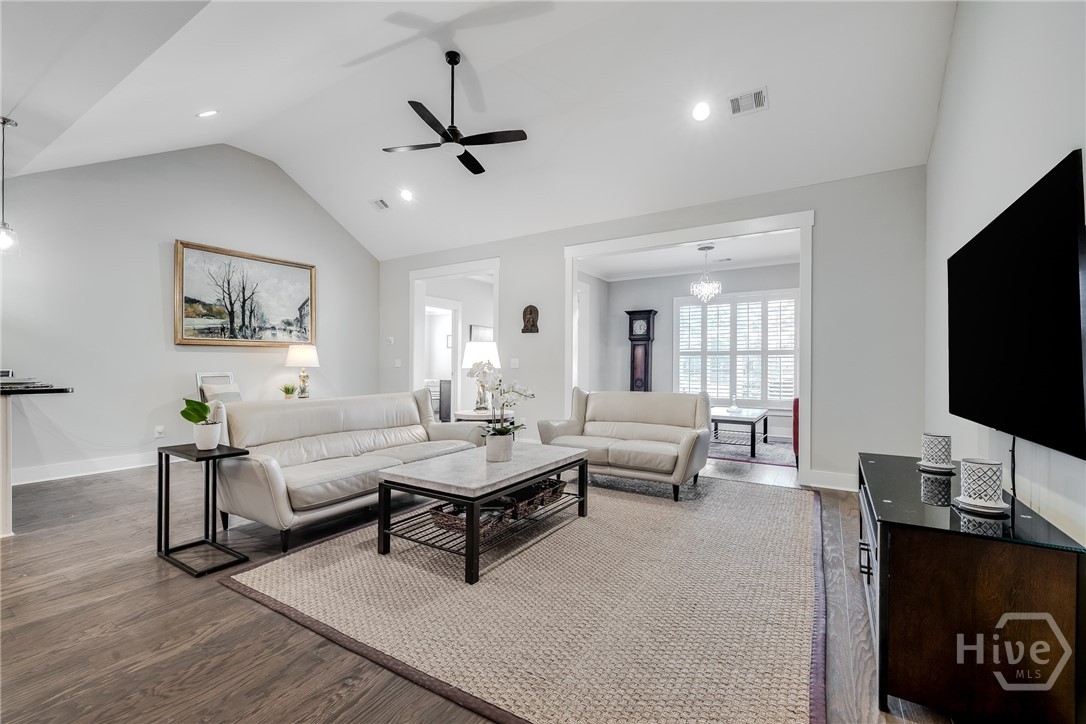 119 Danbury Court Pooler, GA 31322 - Photo 6 of 37 Great Room - with view of back foyer, Carolina Room and entrance to Primary suite