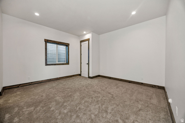 300 Knoll Loop, Unit 227 Fish Haven, ID 83287 - Photo 32 of 56 Unfurnished room featuring carpet and recessed lighting