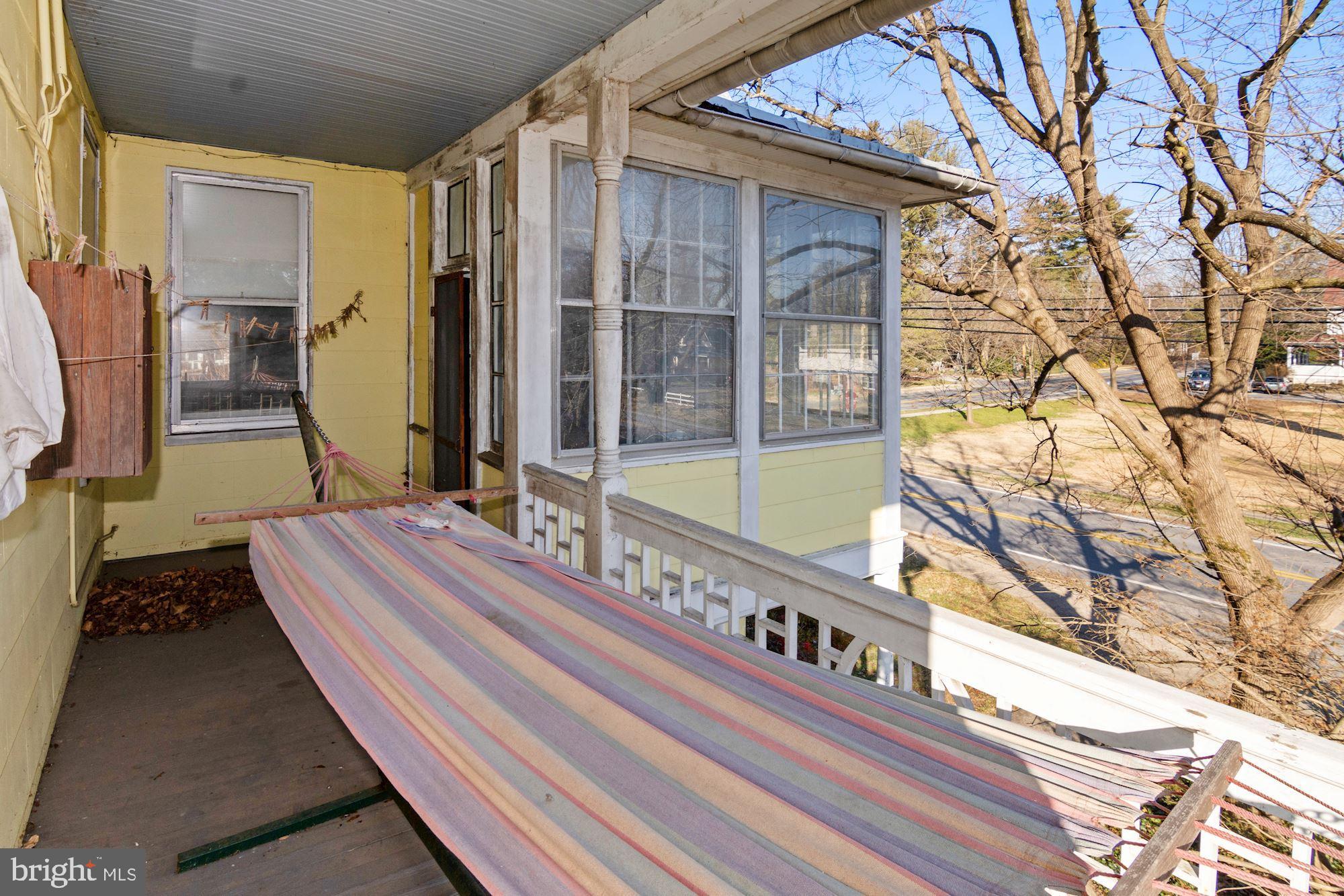 4801 Butler Road Glyndon, MD 21136 - Photo 37 of 80 Open Porch with hammock, next to sun room