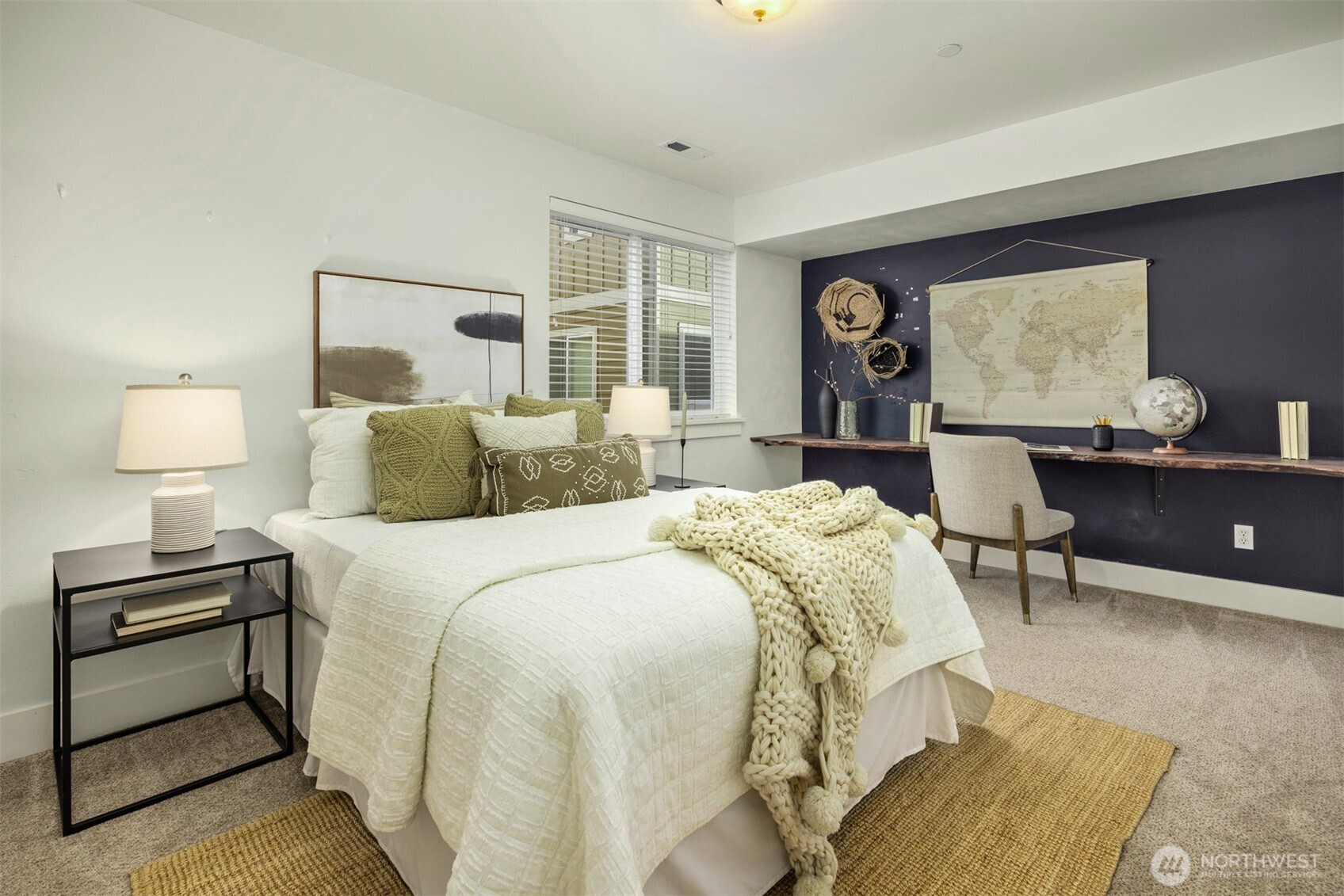 5233 Russell Avenue Northwest, Unit A Seattle, WA 98107 - Photo 14 of 29 a bedroom with a bed and window