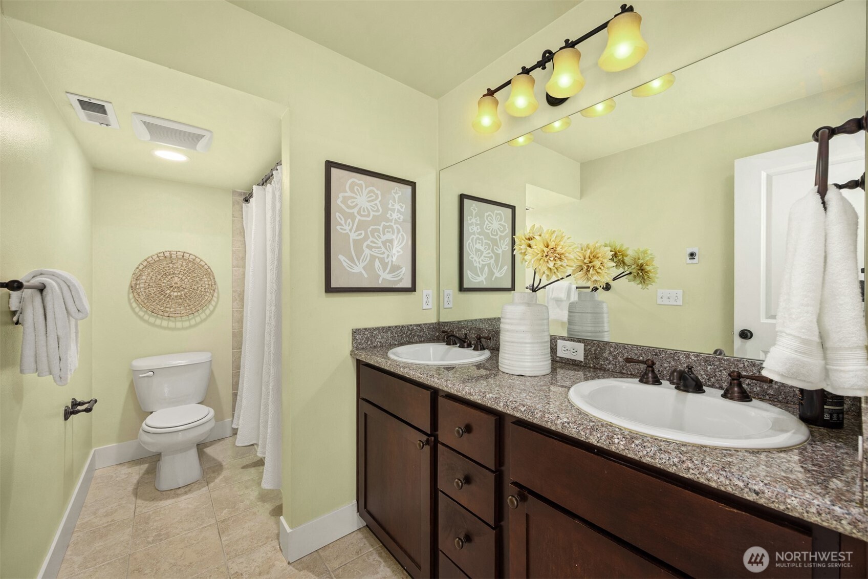 5233 Russell Avenue Northwest, Unit A Seattle, WA 98107 - Photo 15 of 29 a bathroom with a granite countertop sink and a mirror