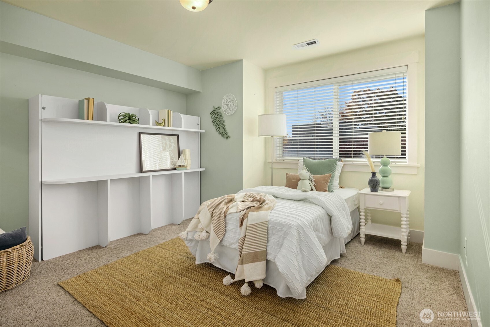 5233 Russell Avenue Northwest, Unit A Seattle, WA 98107 - Photo 16 of 29 a bed room with a bed and a window