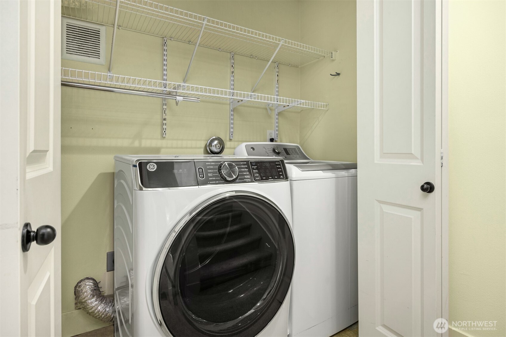5233 Russell Avenue Northwest, Unit A Seattle, WA 98107 - Photo 17 of 29 a utility room with dryer and washer