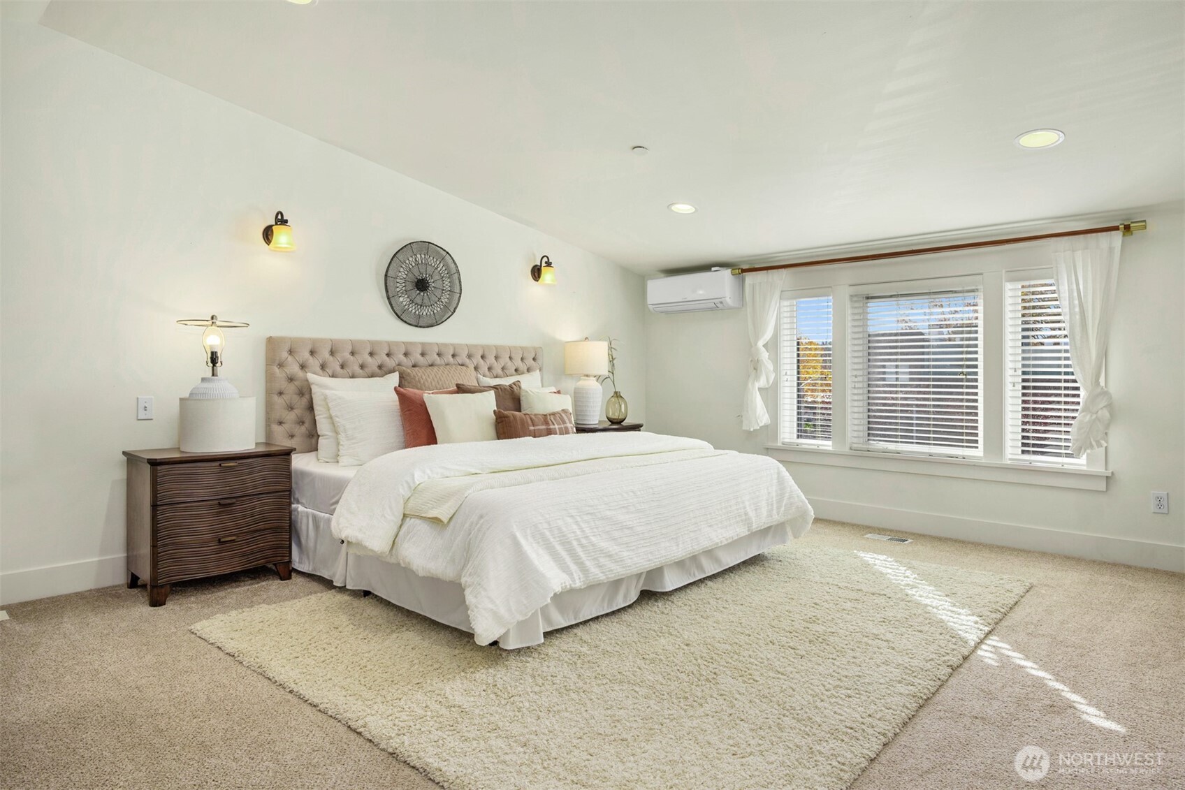 5233 Russell Avenue Northwest, Unit A Seattle, WA 98107 - Photo 18 of 29 a bedroom with a bed and window