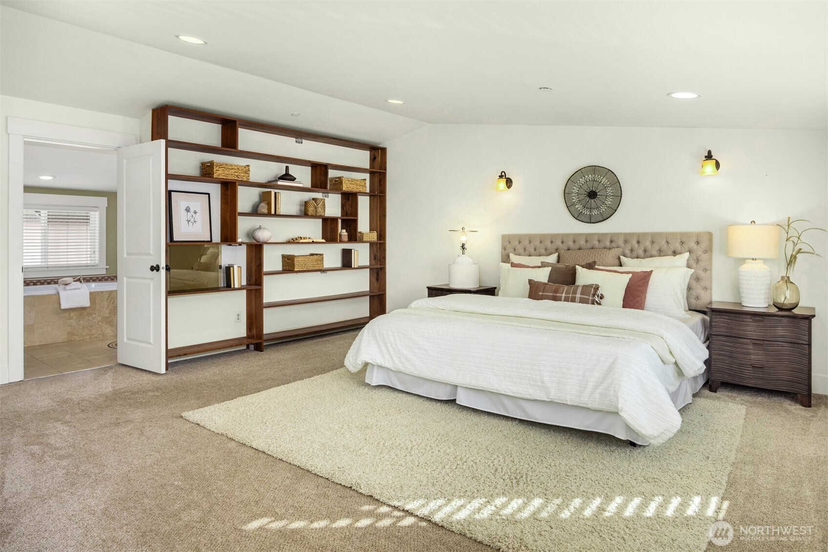 5233 Russell Avenue Northwest, Unit A Seattle, WA 98107 - Photo 19 of 29 a bedroom with a bed and a large window