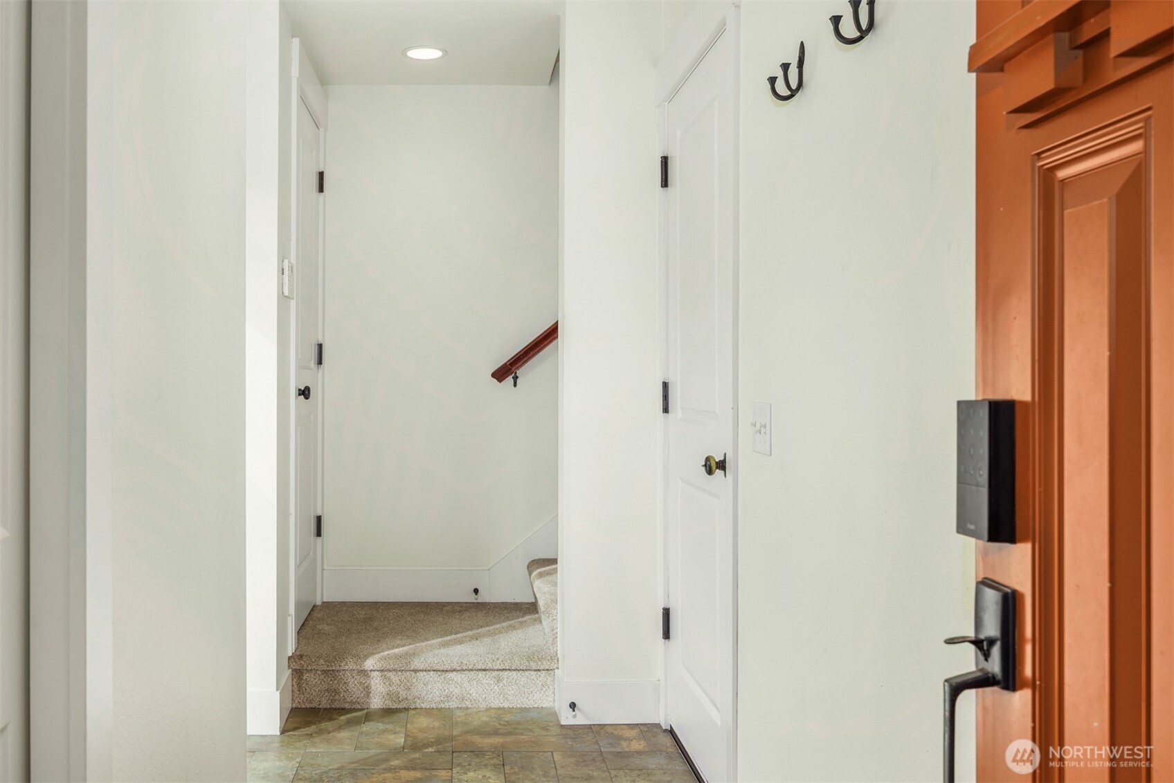 5233 Russell Avenue Northwest, Unit A Seattle, WA 98107 - Photo 24 of 29 an empty room with windows