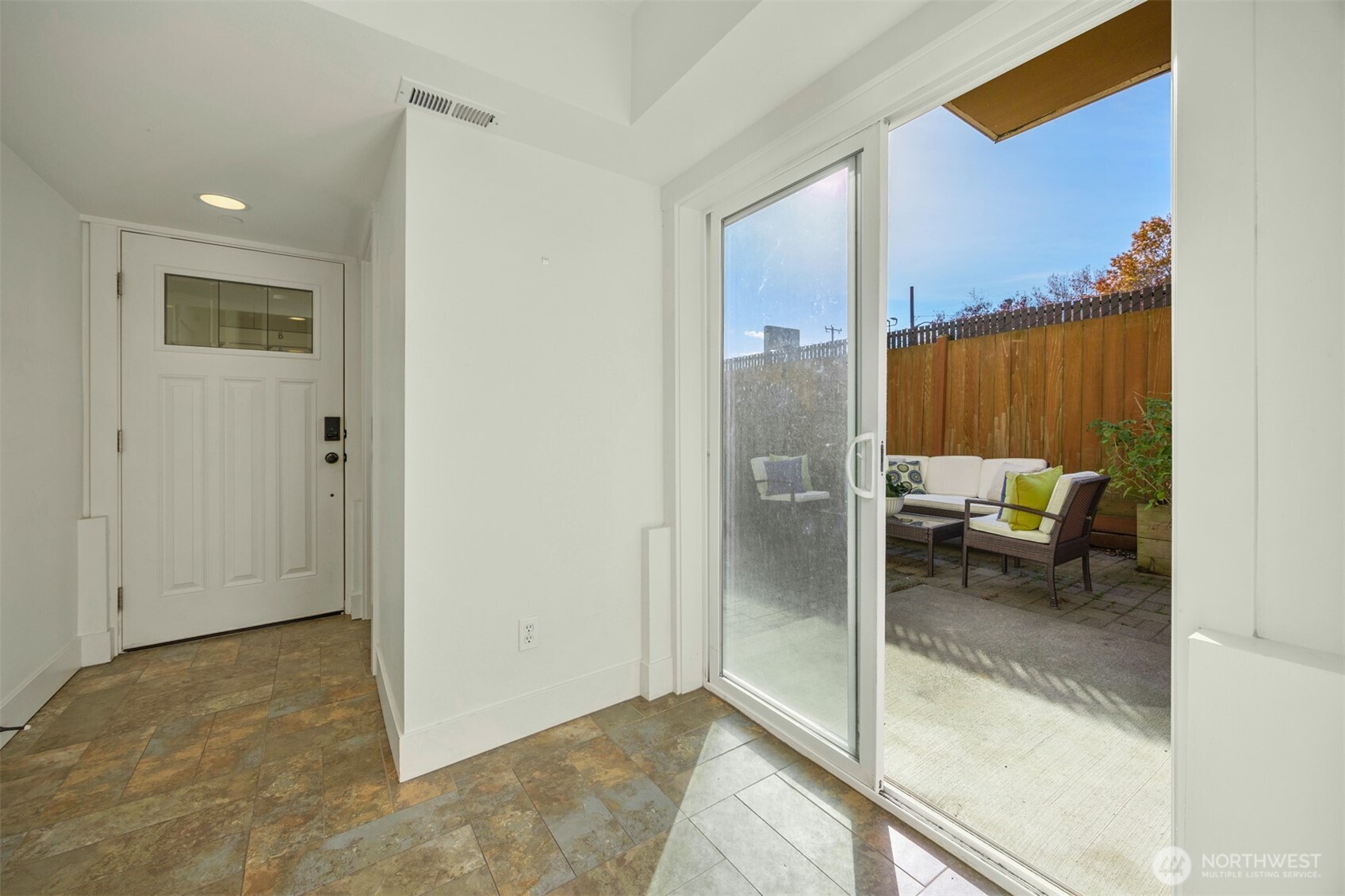 5233 Russell Avenue Northwest, Unit A Seattle, WA 98107 - Photo 26 of 29 a view of a hallway and a livingroom and a bathroom