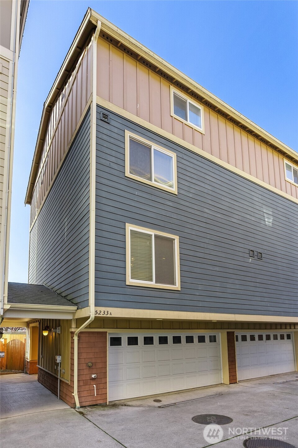 5233 Russell Avenue Northwest, Unit A Seattle, WA 98107 - Photo 28 of 29 a view of a house with a garage