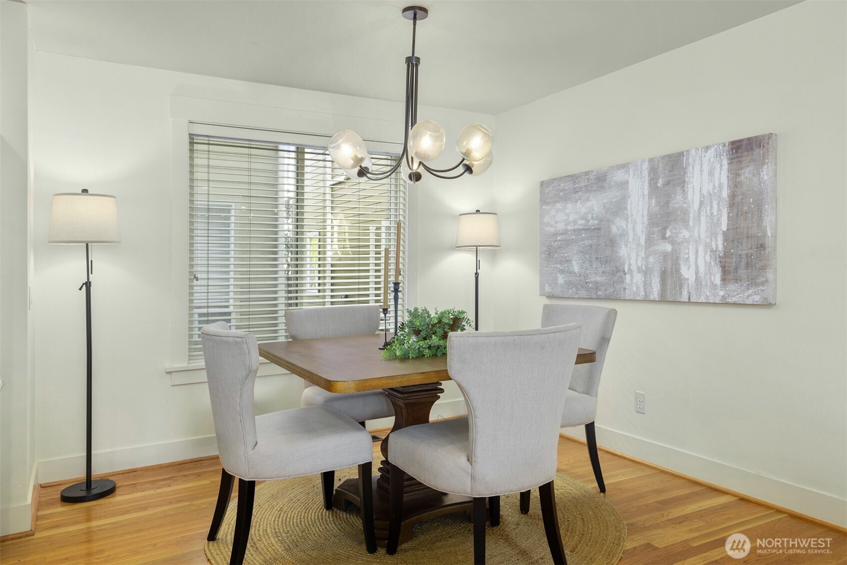 5233 Russell Avenue Northwest, Unit A Seattle, WA 98107 - Photo 6 of 29 a view of a dining room with furniture window and wooden floor
