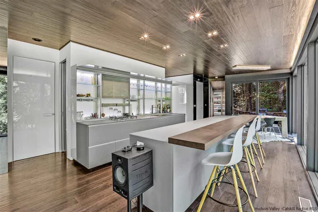 a view of a kitchen and dining room