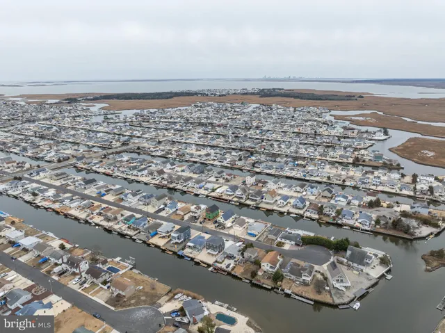a view of a wooden deck and city view