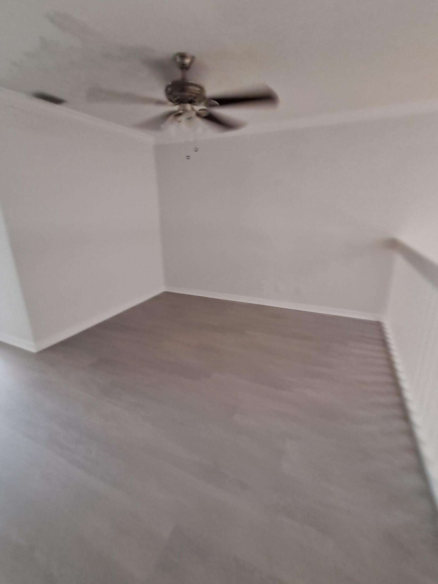 12236 Sag Harbor Court, Unit 4 Wellington, FL 33414 - Photo 7 of 11 a view of an empty room