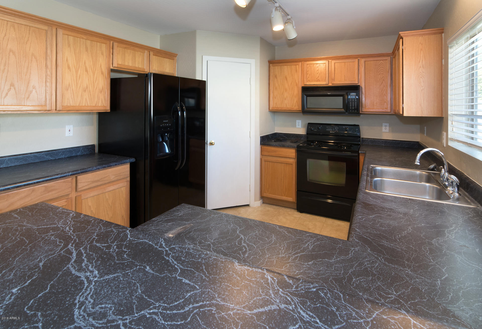 17756 West Calavar Road Surprise, AZ 85388 - Photo 17 of 38 Kitchen