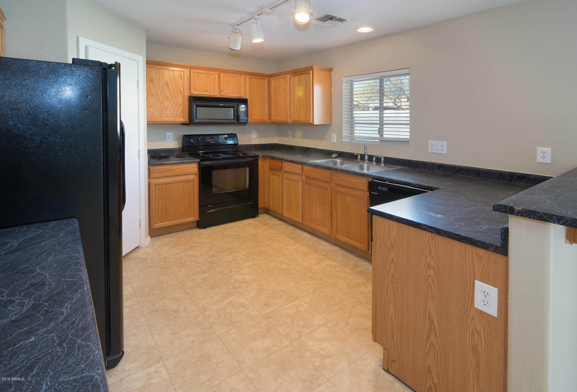 17756 West Calavar Road Surprise, AZ 85388 - Photo 19 of 38 Kitchen Area