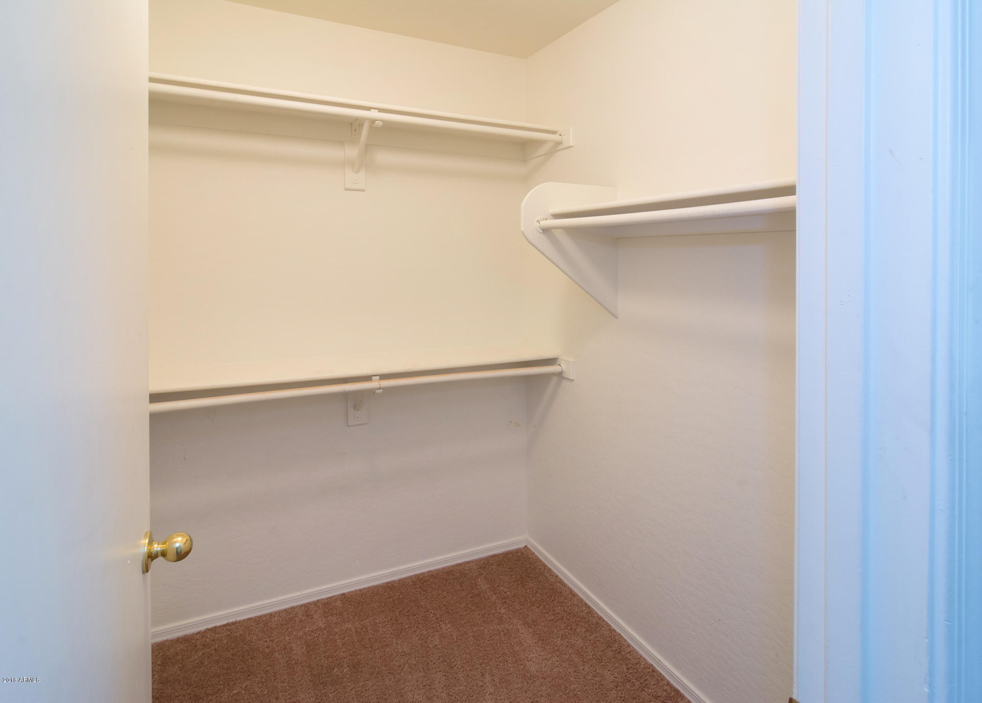 17756 West Calavar Road Surprise, AZ 85388 - Photo 23 of 38 Bedroom 3 Closet
