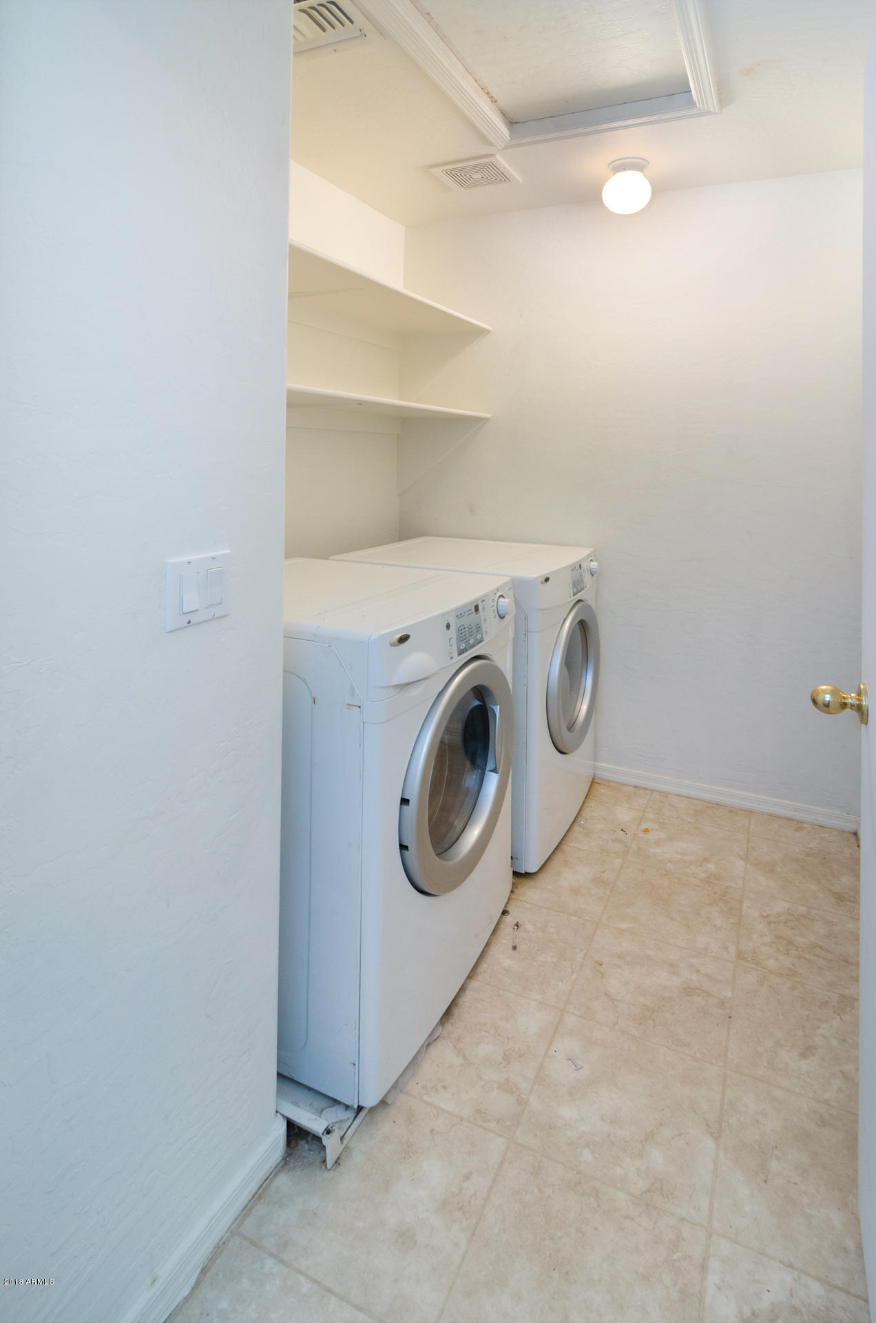17756 West Calavar Road Surprise, AZ 85388 - Photo 33 of 38 Laundry Room Vert