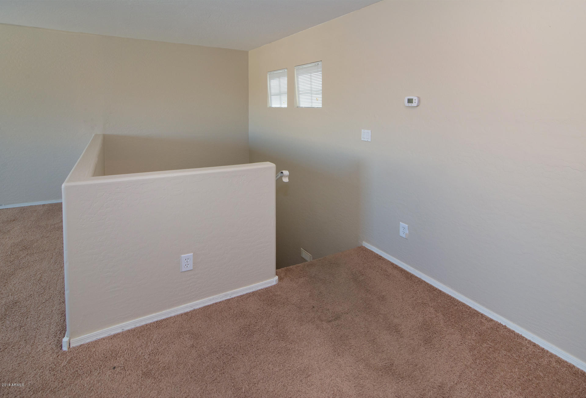 17756 West Calavar Road Surprise, AZ 85388 - Photo 38 of 38 Loft Stairs