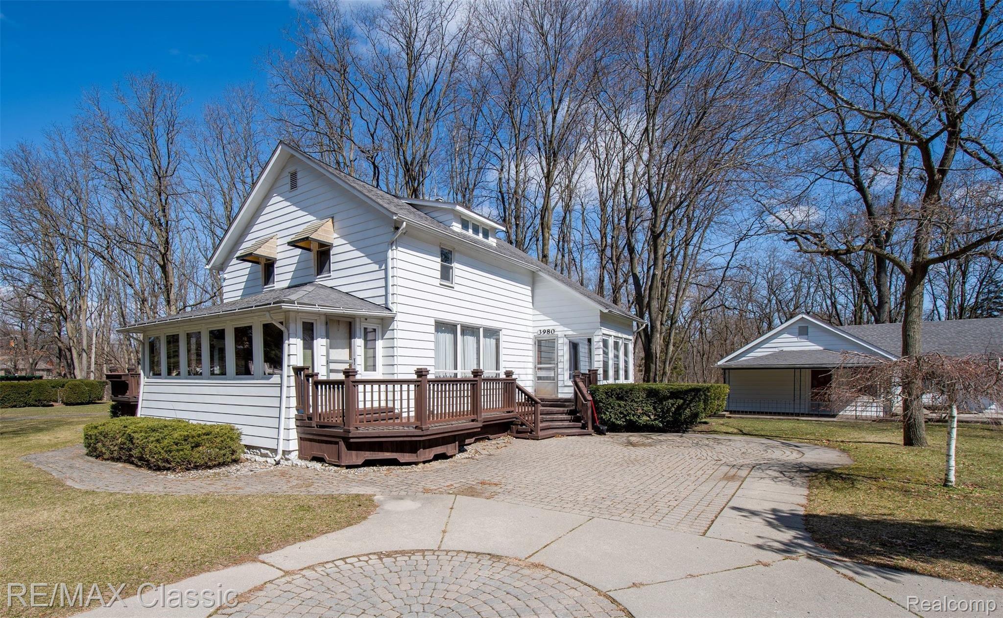 3980 Benstein Road Commerce Township, MI 48382 - Photo 1 of 68 Welcome to the 3980 Benstein compound! Farmhouse, ranch with 2 apartments, detached garage, canalfront to Commerce Lk, all on 3.68 acres!