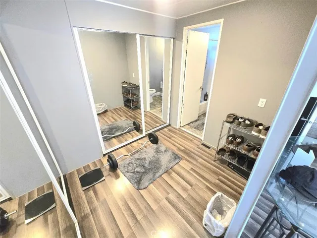 a view of living room and wooden floor