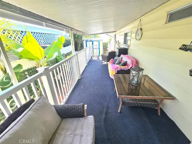 a living room with a couch and a table