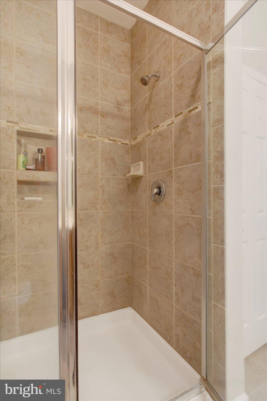131 Fairplay Road Gettysburg, PA 17325 - Photo 20 of 38 Sleek modern shower with elegant tiles.