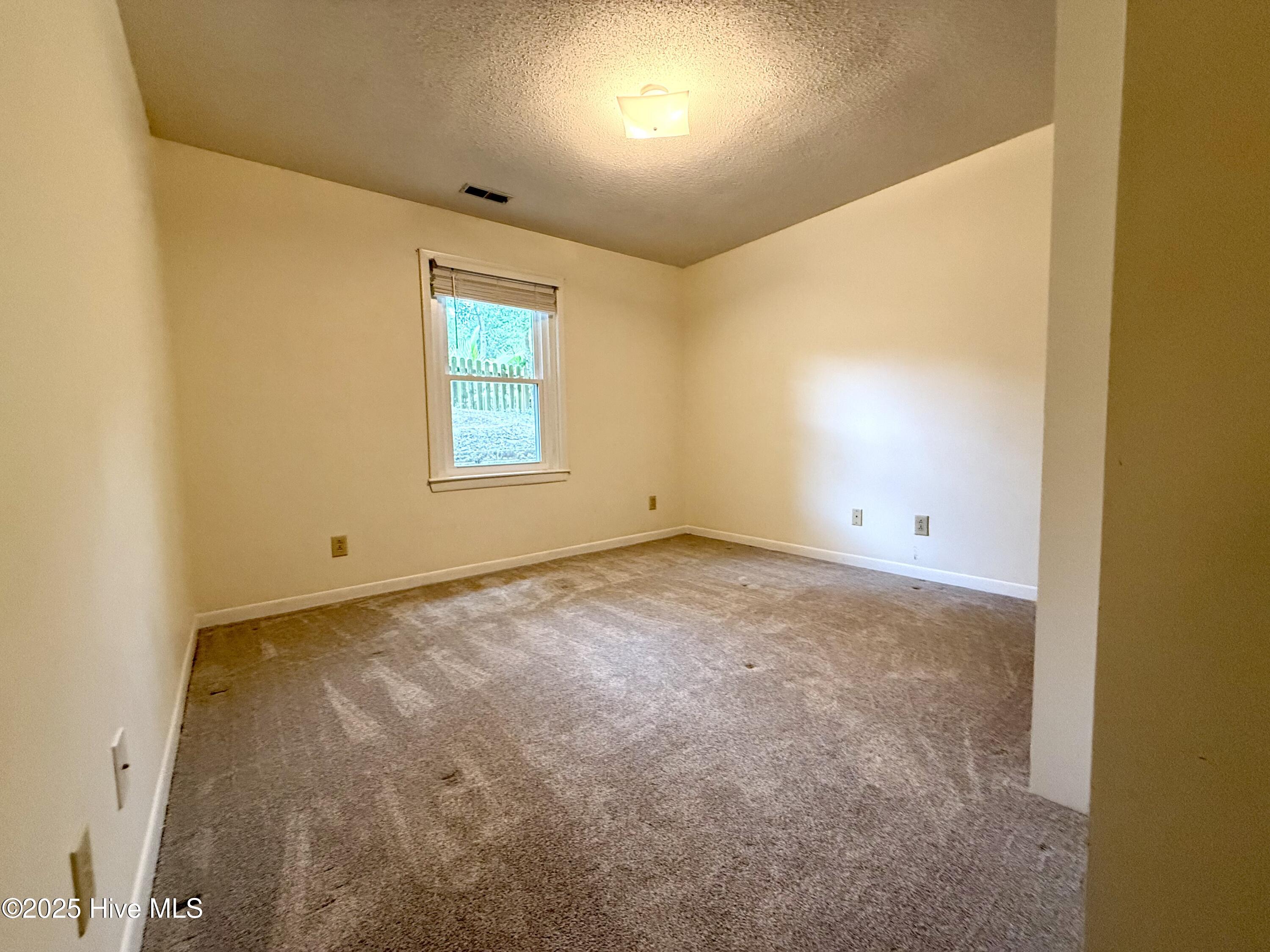 110 Holly Road Pine Knoll Shores, NC 28512 - Photo 26 of 30 Bedroom 3