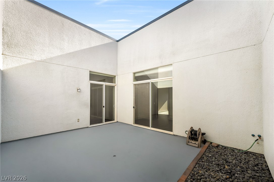 2775 West Pebble Road, Unit 505 Las Vegas, NV 89123 - Photo 23 of 26 A private, sun-drenched courtyard provides an ideal setting for relaxation.