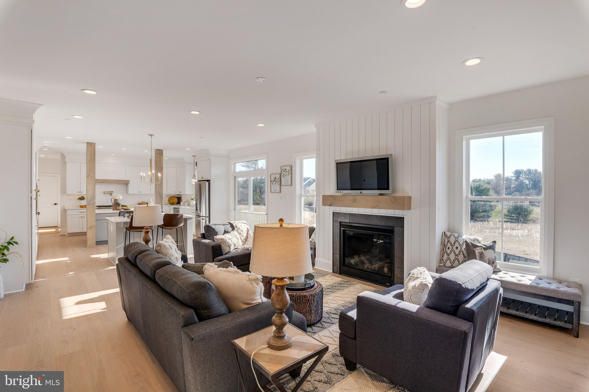Lot 5 Arden Drive Fallston, MD 21047 - Photo 5 of 11 a living room with furniture fireplace and a large window