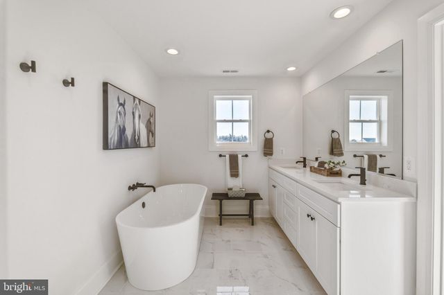 a bathroom with a sink and a bathtub