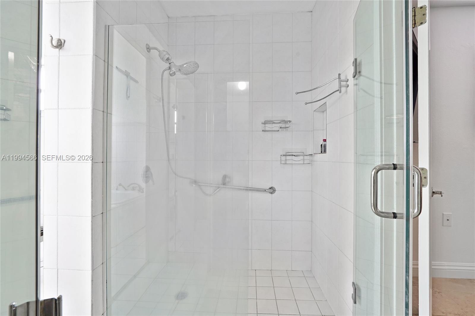 2834 Southwest 33rd Avenue Miami, FL 33133 - Photo 21 of 36 a bathroom with a shower