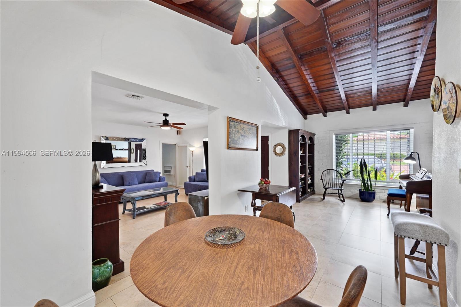 2834 Southwest 33rd Avenue Miami, FL 33133 - Photo 3 of 36 a view of a dining room with furniture