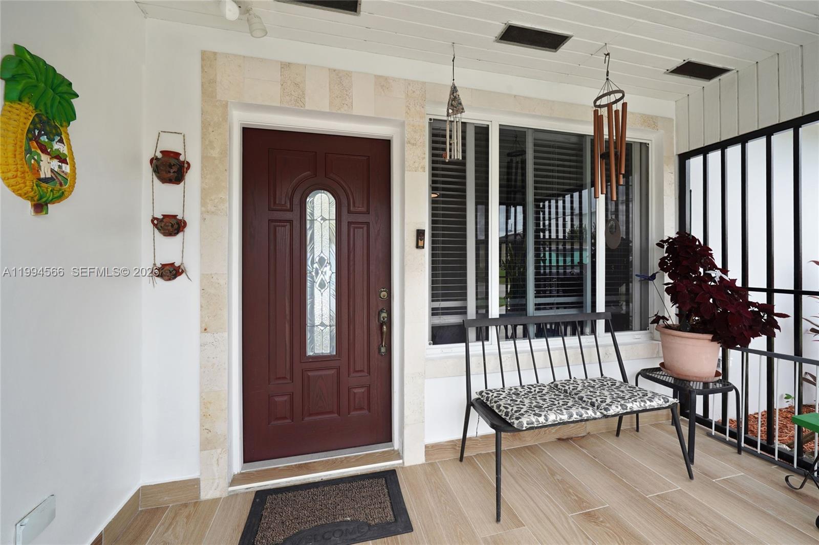 2834 Southwest 33rd Avenue Miami, FL 33133 - Photo 36 of 36 a view of a hallway with wooden floor and front door