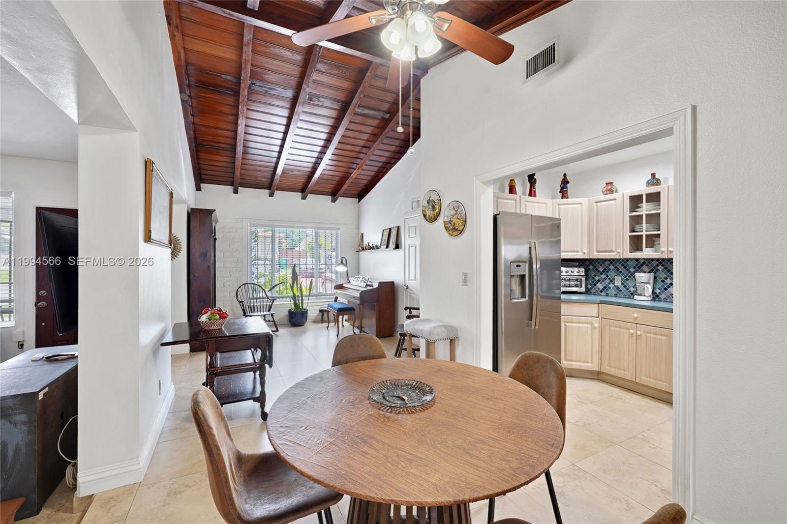 2834 Southwest 33rd Avenue Miami, FL 33133 - Photo 4 of 36 a dining room with furniture and window