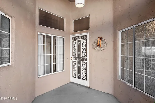 a view of empty room with windows